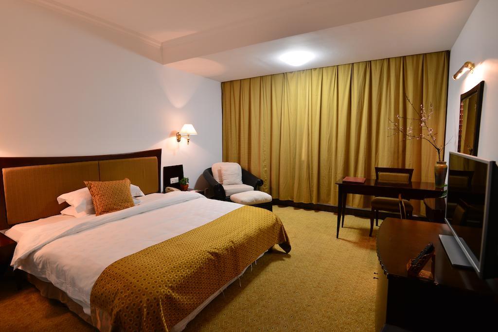 Baodao Exhibition Center Hotel Wuyishan (Fujian) Quarto foto